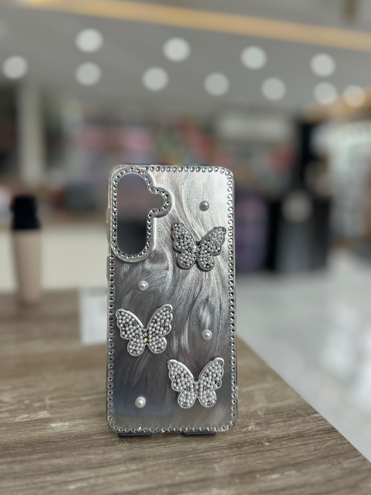 funda brillo con mariposas