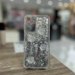 Funda brillo con charms