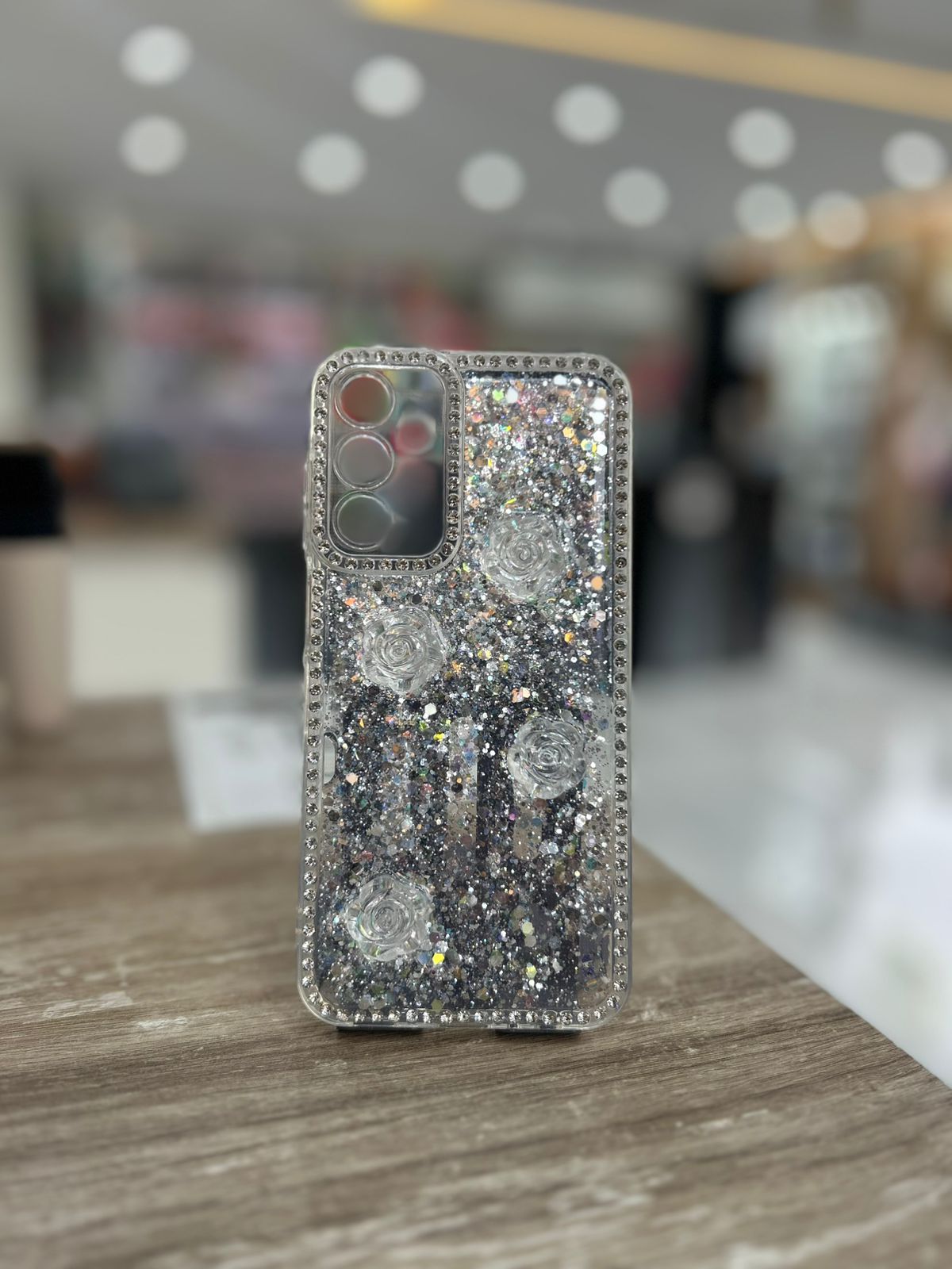 Funda brillo con charms